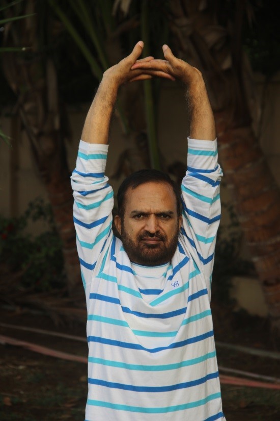Hand Stretching Against Wall